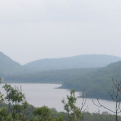 a view of lake in the clouds
